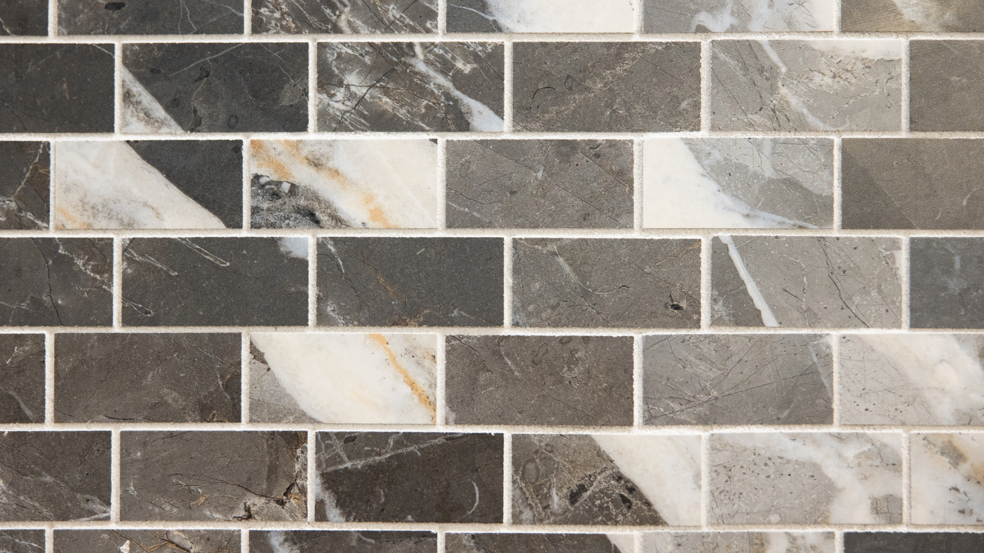 Close-up of a black and white tile wall